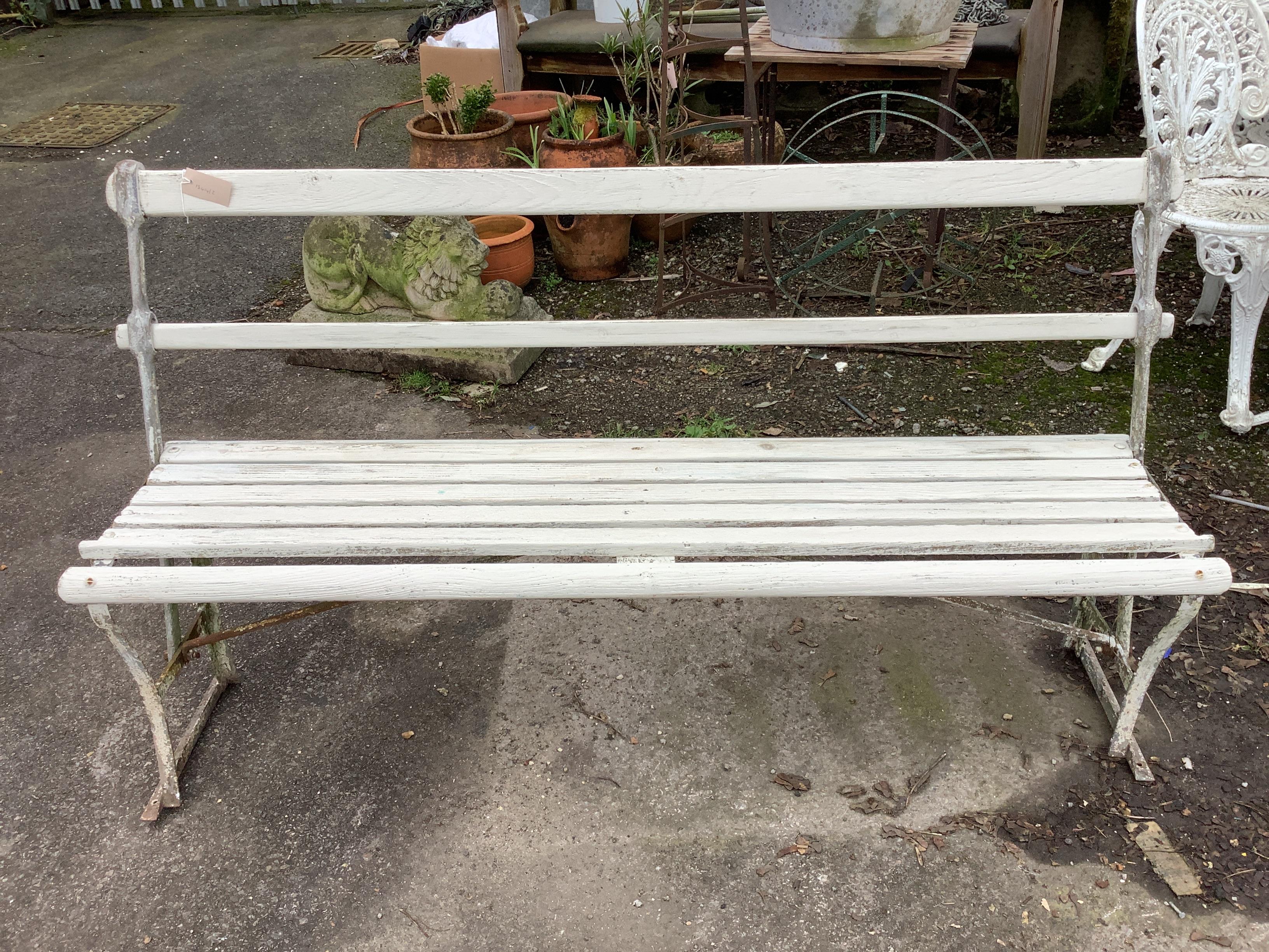 A reversible slatted wood bench, width 145cm, height 80cm